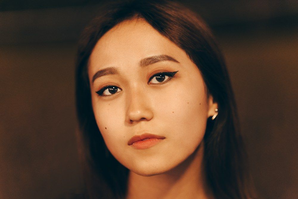 Softly lit portrait showing natural facial contours