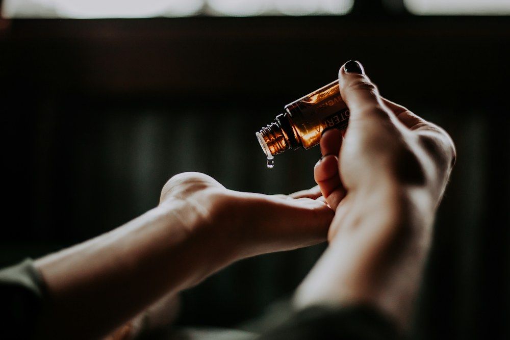 Skincare serum being applied to the hand