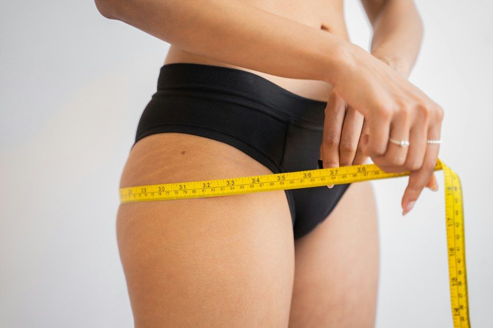 Measuring tape around the waist